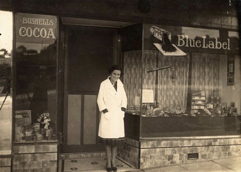 [Iris Wright in front of her delicatessen, 319 Moreland Road, Coburg, 1929–30