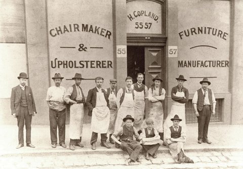 Staff outside the premises of H. Copland, Furniture manufacturer and upholsterer, 55-7 La Trobe Street, Melbourne, 1971
