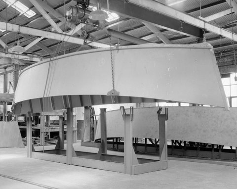 Hull of small metal boat at the Melbourne Motor Body Works, West Melbourne, 1940s
