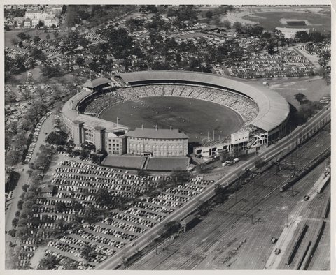 Aerial view of the Melbourne Cricket Ground showing the old stand, 1952