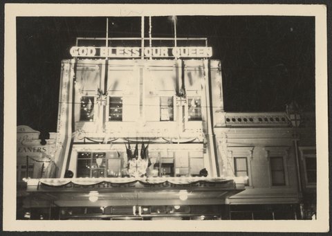 Floodlit view of Oliver J. Nilsen & Co., Electrical Engineers, 45 Bourke Street, Melbourne, 1954