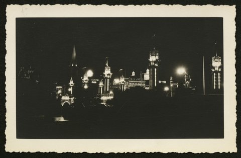Elevated view across the Yarra River showing Melbourne skyline at night, 1930–50