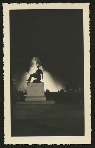 Statue of Adam Lindsay Gordon silhouetted against floodlit fountain, Gordon Reserve, Melbourne, 1930–50