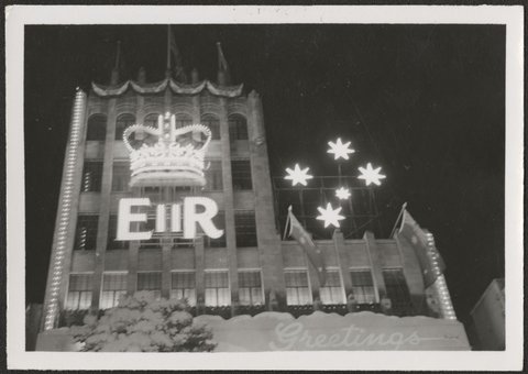 Illuminated crown and lettering on the facade of the Coles Store, Bourke Street, Melbourne, 1954