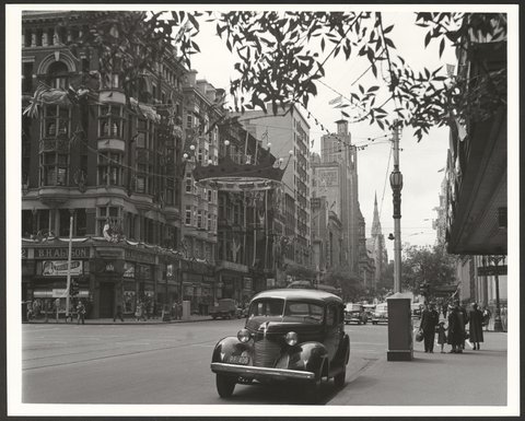 Collins and Elizabeth Street intersection, Melbourne, decorated for the 1954 Royal Tour by Queen Elizabeth and Prince Phillip