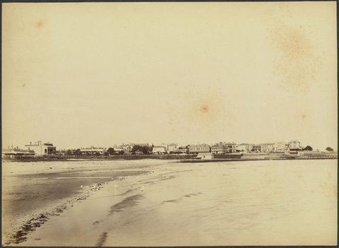 View of St. Kilda Esplanade showing buildings and beach from shoreline, 1888?