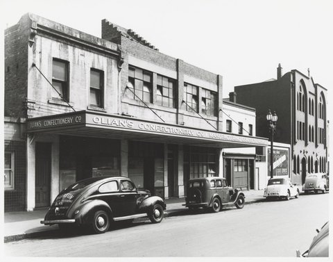 Spring Street - west side, showing Olian's Confectionary Co. at 247-255, 1950
