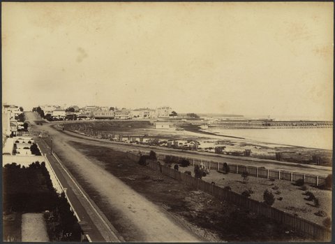 View of the Esplanade, Beaconsfield Parade and Fitzroy Street, St. Kilda; showing buildings, beach, pier and Hegarty's Railway Baths, 1888?