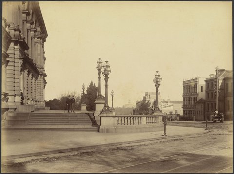 View across the Treasury steps looking south down Spring Street, showing Government House in the background, 1888?