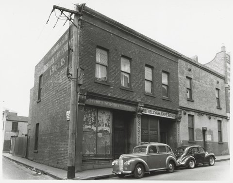 Little Lonsdale Street - north side, looking at corner with Burton Street down to Merritt's Place, 1950