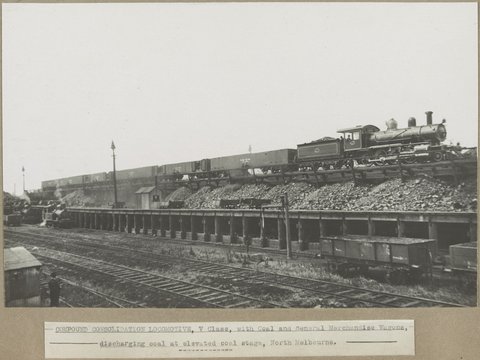 COMPOUND CONSOLIDATION LOCOMOTIVE, V Class, with Coal and General Merchandise Wagons, discharging coal at elevated coal stage, North Melbourne, 1905–28