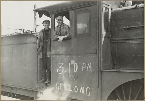 First train from new country platform Spencer St. [Close-up of driver and assistant in engine.], 1923