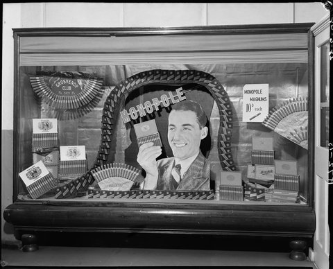 Tobacconist's and barber's display windows, 5 Fitzroy St., St. Kilda, 1948