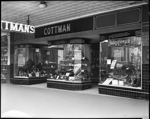 Motorcycle and bicycle shops of Milledge Bros. at 287-9, Cottman & Co. at 291-3 and Turner Bros. at 295 Elizabeth St., Melbourne, 1948