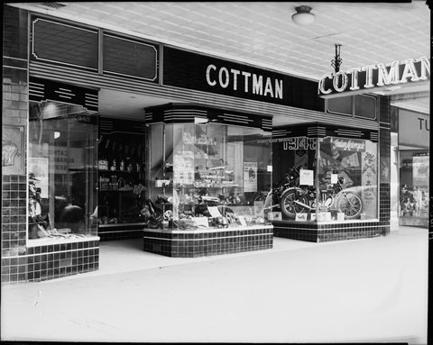 Motorcycle and bicycle shops of Milledge Bros. at 287-9, Cottman & Co. at 291-3 and Turner Bros. at 295 Elizabeth St., Melbourne, 1948