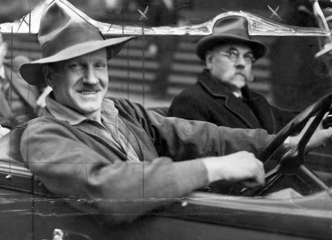 William Hatfield, author, of "Sheepmates," snapped at the wheel of his car outside Elizabeth Street Post Office, c. 1934