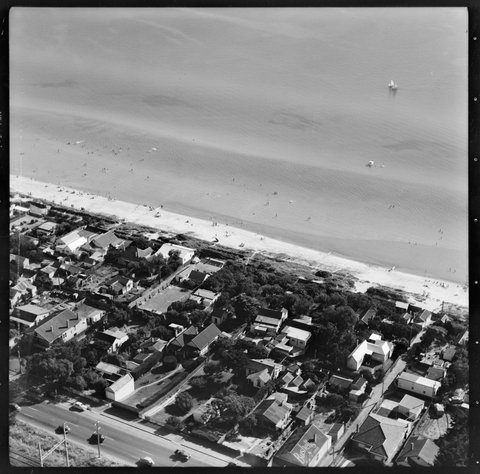 Aerial views of coastline and town of Chelsea, Victoria, 1950