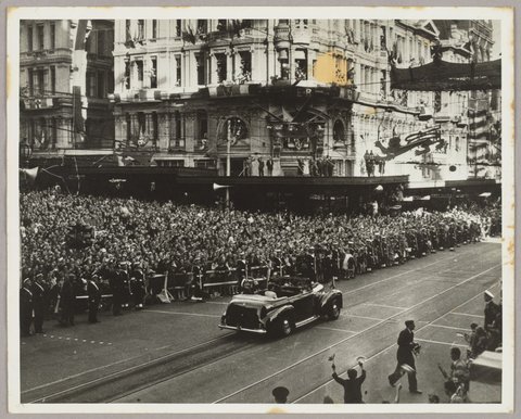 Elevated view of Queen Elizabeth II and Prince Philip in car on Collins Street, 1954
