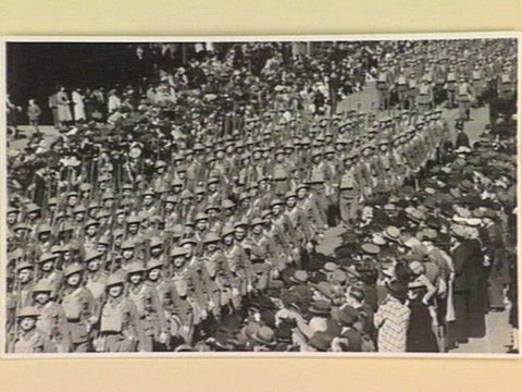 Marching six abreast these A.I.F. men swing along Swanston Street Melbourne ... to aid the Red Cross Victory V appeal, 1939–45