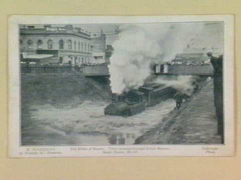 The Effect of Storm. Train passing through Flood Waters, South Yarra, 25-01-07, c. 1907