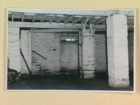Interior of Williamstown building showing stone pillars used to chain convicts, c. 1941