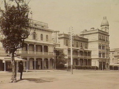 View of Fitzroy Street, south side, row of businesses, c. 1890
