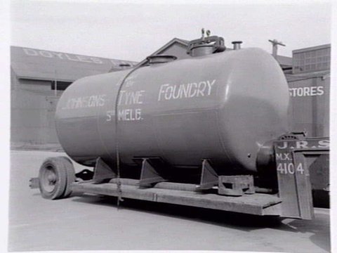 Johnsons Tyne Foundry, South Melbourne, boiler loaded on rear of truck, c. 1940