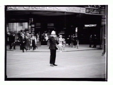Policeman directing pedestrian traffic in Melbourne, 1936–39