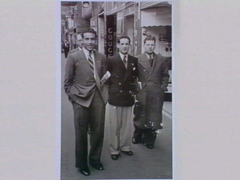 J. Dougall (left), C. Cassar and a friend in Collins St., Melbourne. 1949