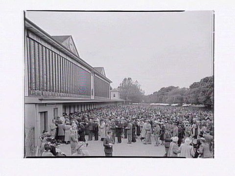 People placing bets at Flemington Racecourse, 1949
