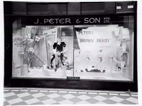 ["Brown Derby" window display of lingerie by Holeproof in the window at J. Peter and Son, Hosiers and Glove merchants, Centreway Arcade, 259 Collins Street, Melbourne, c. 1941