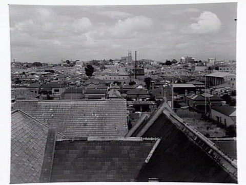 Elevated view over the rooftops of Richmond with Pelaco factory in distance, c. 1941