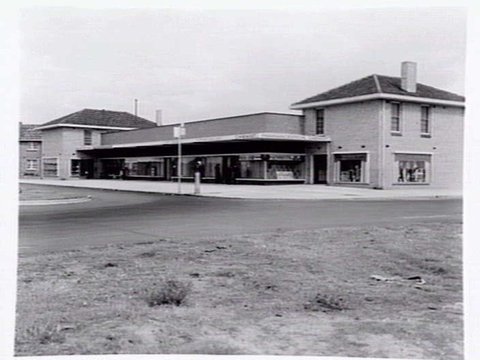 Shopping centre at Centre Avenue, Port Melbourne, with G. Rose, fruiterer at no. 19 and J.H. Hodges at no. 9, c. 1942
