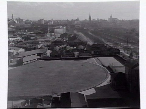 View over roof tops looking towards city along St. Kilda Road, Melbourne, shows Radio Corporation building to left, c. 1943