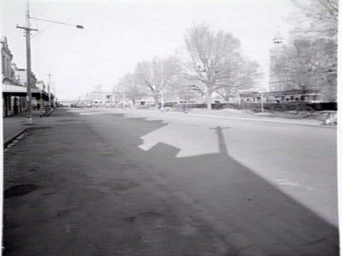 Victoria Parade, shows Angus Reserve, sign to Dr. Singleton's Homes for Women, East Melbourne, c. 1943