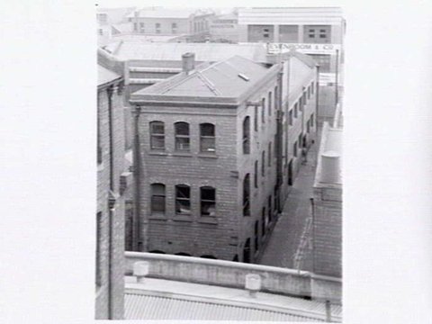 Rear, Phoenix Press Building, 359 Little Lonsdale Street, Melbourne and part of rear of Zevenboom & Co., 333 Elizabeth Street, Melbourne, c. 1946