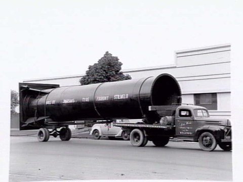 Truck from Johnsons Tyne Foundry, cnr. Lorimer & Tyne St. South Melbourne, carrying piping, 1947