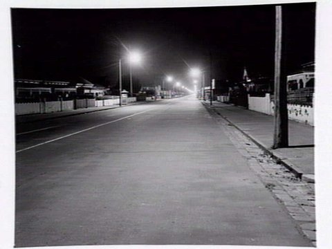 Suburban street at night, Williamstown, 1949