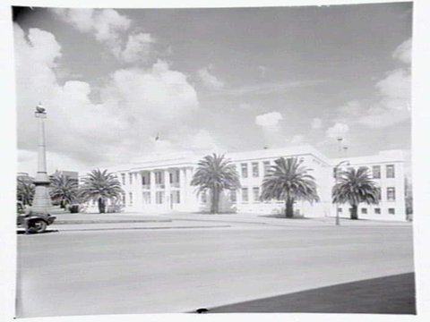 Emily McPherson College of Domestic Economy and the Eight Hours Day monument at the corner of Russell and Victoria Sts., Melbourne, c. 1949