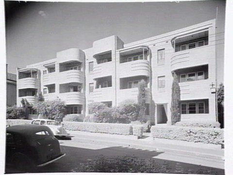Block of three storey apartments with balconies, possibly in South Yarra/Toorak area, 1949