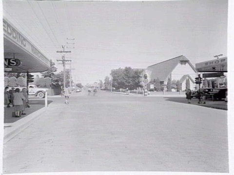 Intersection of High St. and Murray Rd., Preston, with All Saints Church on corner, c. 1949