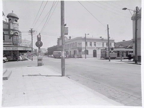 Intersection of Johnston & Brunswick Sts., Fitzroy, showing Provincial Hotel and Solway mens' store, c. 1949