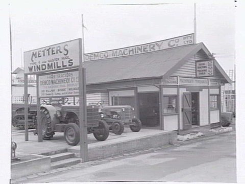 Demco Machinery Co. display of tractors, possibly at 355 William Street, Melbourne, c. 1951