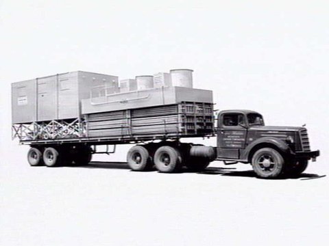 Loaded semi trailer belonging to Geo. Houlder, Brunswick, interstate cartage hauler, c. 1952