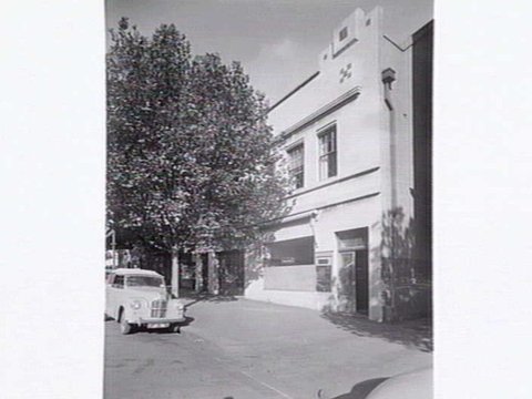 Car parked outside Joubert's building, 575 Bourke St., Melbourne, c. 1953