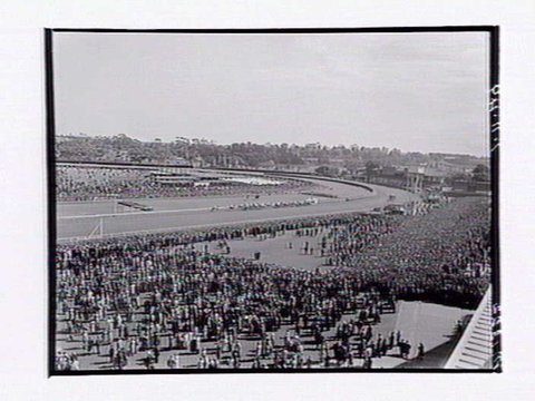 Bird's-eye view of horserace at Flemington Racecourse on Melbourne Cup Day, 1949
