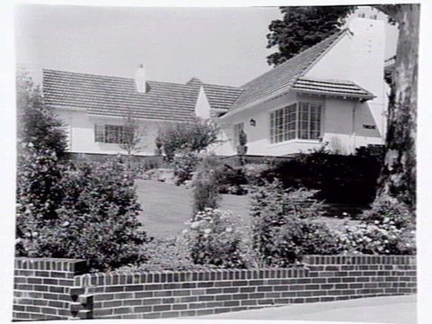 Exterior and garden of Miss Cunningham's house at Kew, possibly at 12 Studley Avenue, Kew, 1939–45