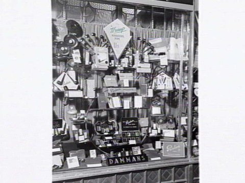 Shop window of Dammans the Tobacconist, 221-3 Collins St., Melbourne, 1948