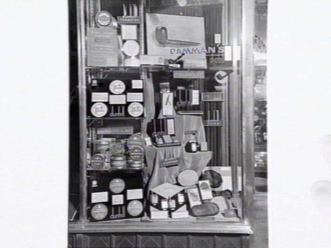 Shop window of Dammans the Tobacconist, 221-3 Collins St., Melbourne, 1948