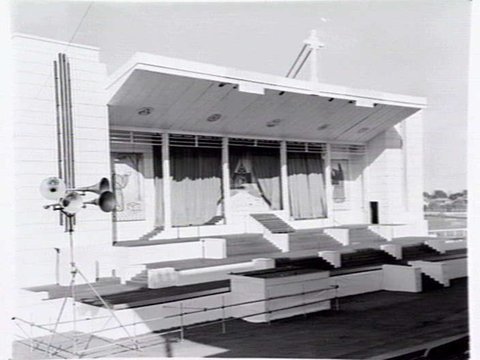 Outdoor stage set up for performance of a passion play to celebrate the centenery of the Melbourne Catholic Diocese, probably at Caulfield Race Course, 1948